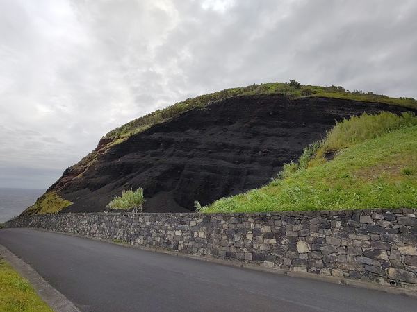 Volcanic coastline at the Ponta da Ferraria Natural Monument